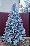 Artificial green cast snow-covered Christmas tree Bukovel 210 cm