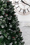 Artificial Christmas tree covered with frost Crystal with cones and viburnum 220 cm