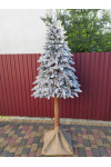 Künstlicher Weihnachtsbaum, gegossen auf einem schneebedeckten Baumstumpf Premium 220 cm